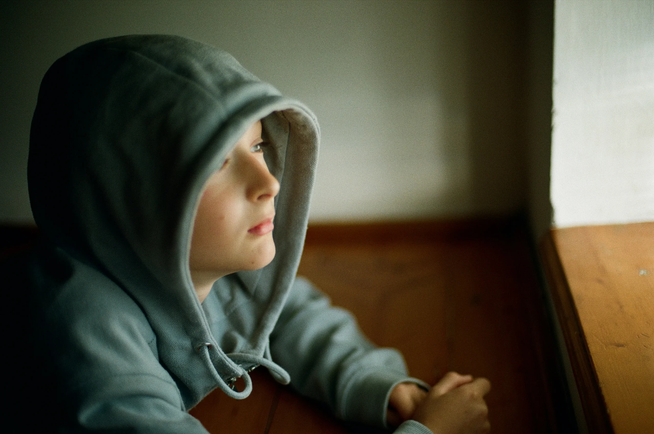 Healing from Childhood Emotional Neglect 2 A alone boy with hood image on article: Healing from Childhood Emotional Neglect by MonaPsyche 3